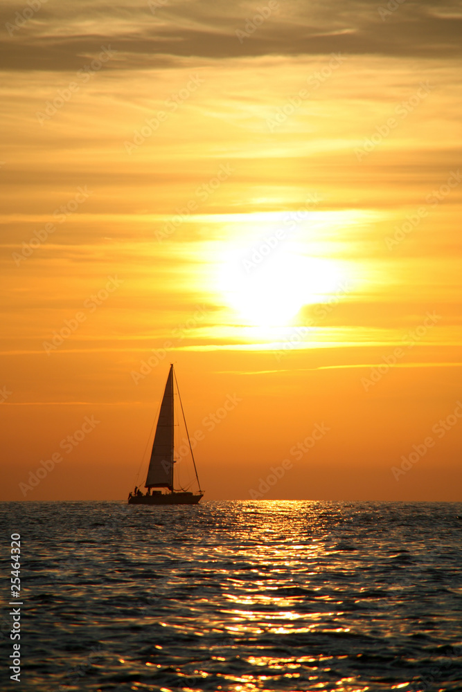 sunset with sailboat