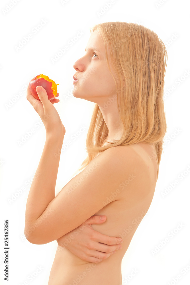 Beautiful young girl eating a peach on white Beautiful young girl eating a peach on white