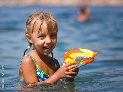 Girl with water pistol