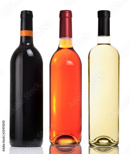 Three bottles with red, pink and white wines