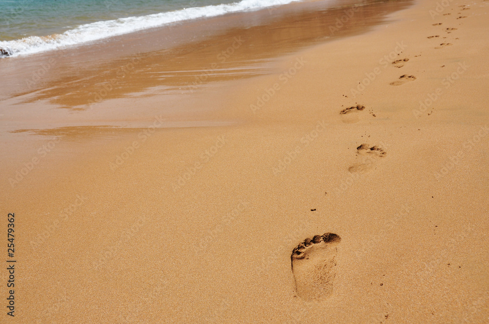 Footmarks on a sandy beach