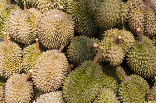 Heap of durians at a market in Asia