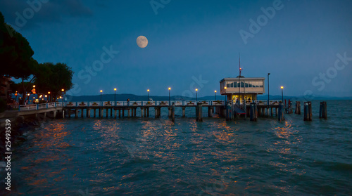 Pier at Passignano, Umbria in moonlight photo