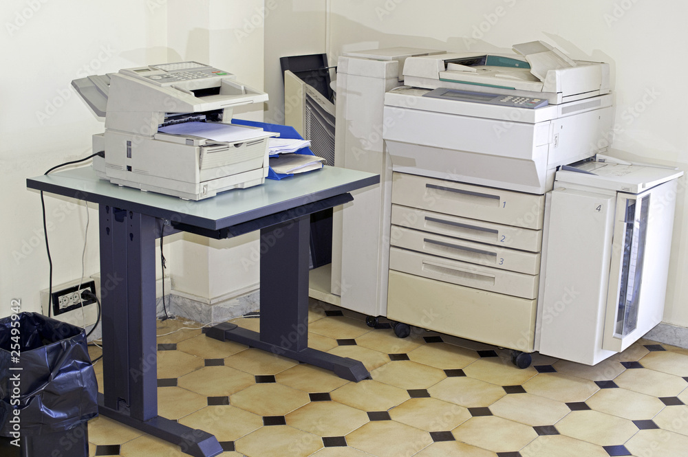 Office room with photocopier and fax machine Office room with photocopier and fax machine