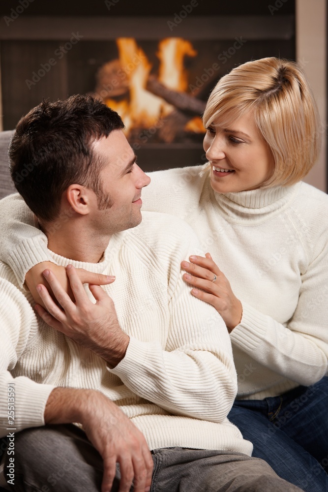 Couple hugging at home Couple hugging at home