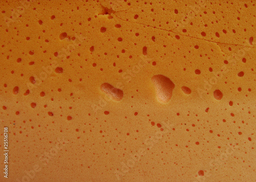 close view of orange industrial foam substance looking somewhat