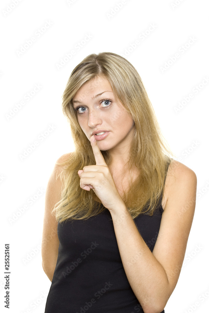 Young Woman Gesturing for Quiet or Shushing Young Woman Gesturing for Quiet or Shushing