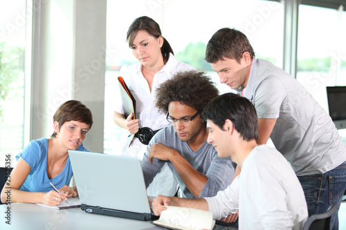 Group of young people in business meeting photo