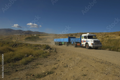 trucks on the pampa (patagonia - argentina)
