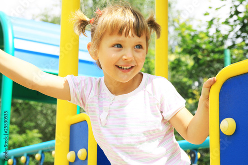 A smiling girl on the playground