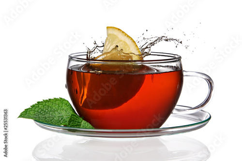 Cup of tea with lemon and splash