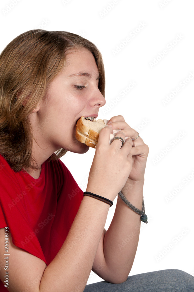 Teenager with Braces Eating a Sandwich Teenager with Braces Eating a Sandwich