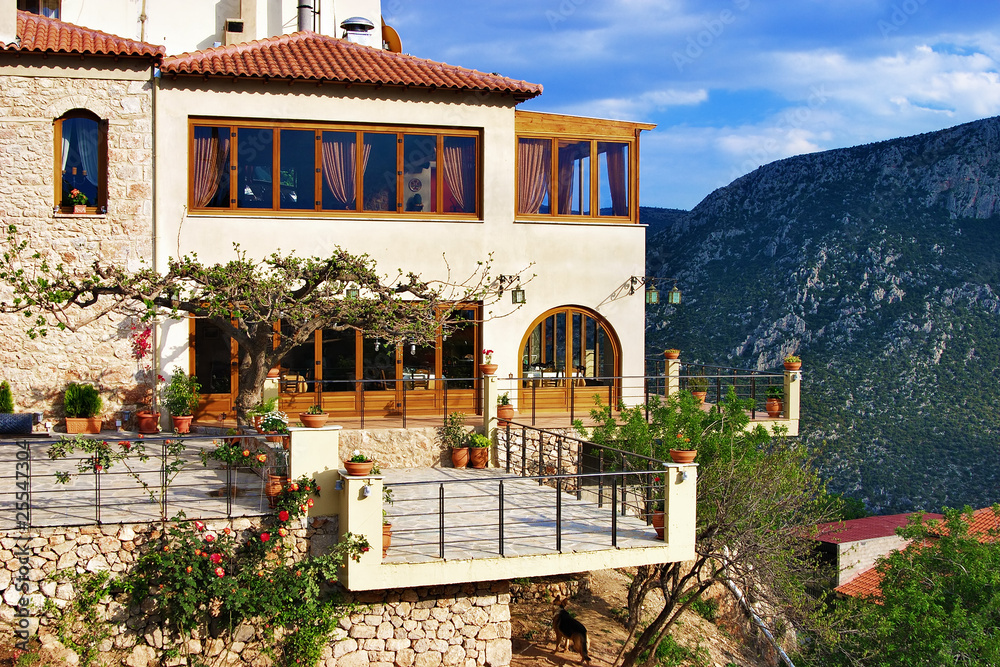 House on a steep slope of Mount Parnassus in Delphi