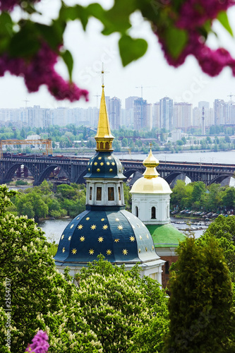View of church, bridge and the left bank in Kiev, Ukraine photo