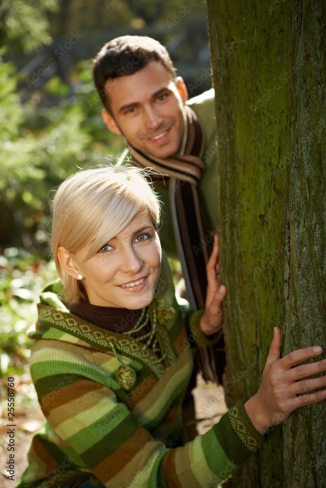 Fototapeta premium Young couple having fun in park
