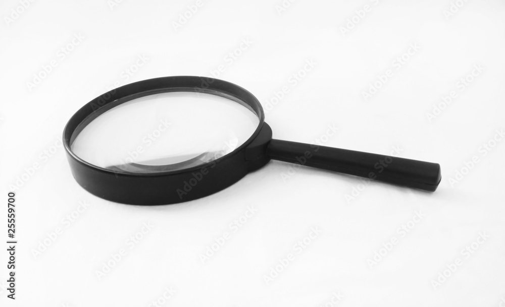 Magnifying glass on white background closeup Magnifying glass on white background closeup