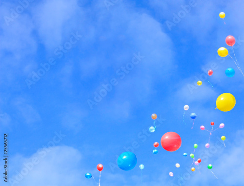 Balloons flying into the sky.