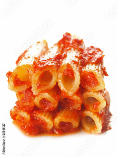 stack of penne in tomato sauce