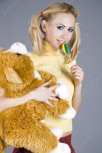 lolita, youn sexy girl holding tedy bear