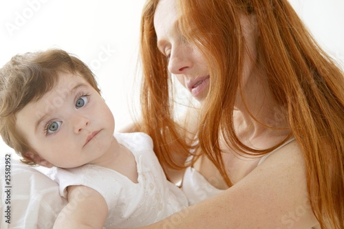 baby and mom in love hug white