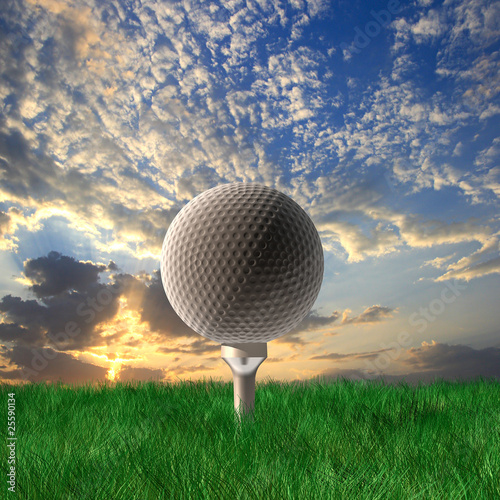 Golf ball under cloudy sky