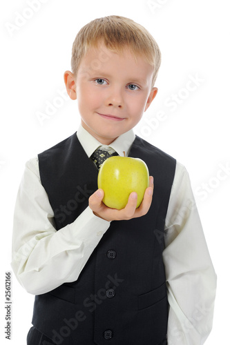 boy holds an apple photo