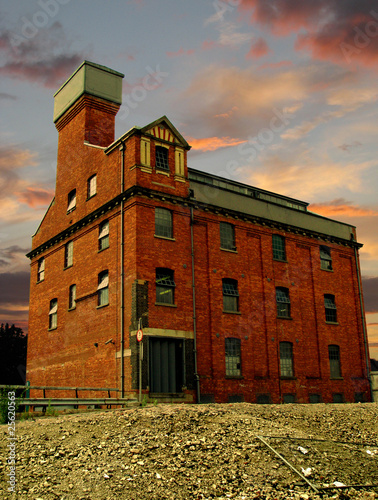 Old factory building at sunset