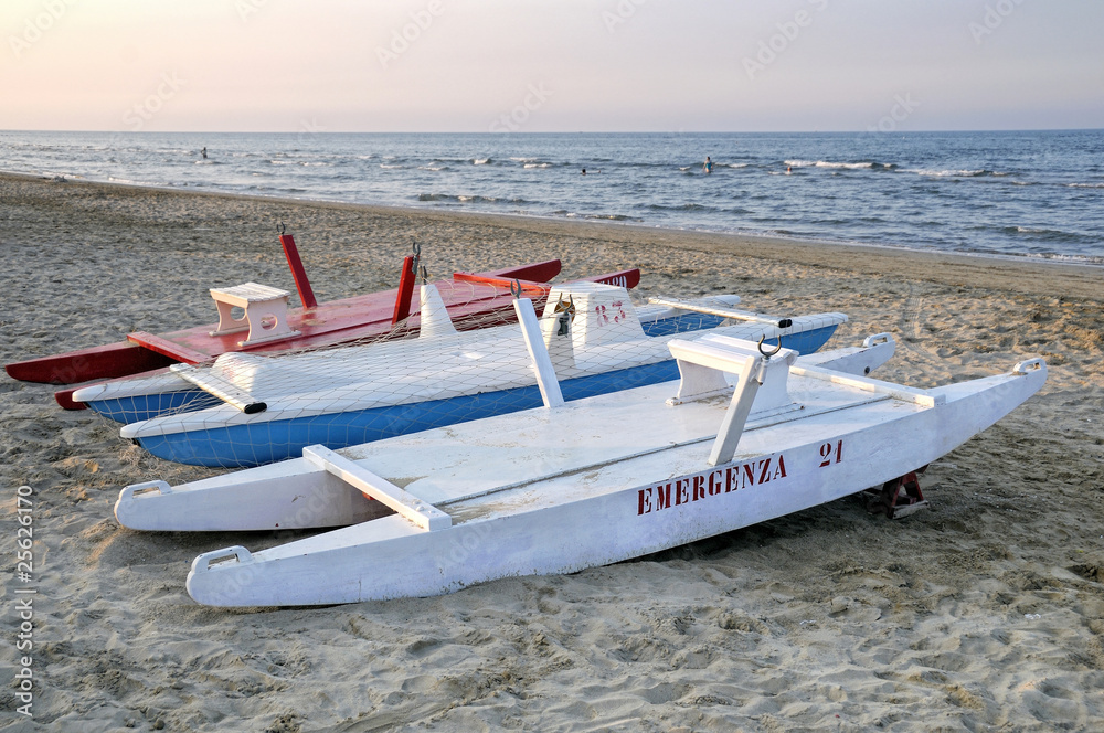 Rescue lifeboats on Rimini beach, Emilia-Romagna, Italy Rescue lifeboats on Rimini beach, Emilia-Romagna, Italy