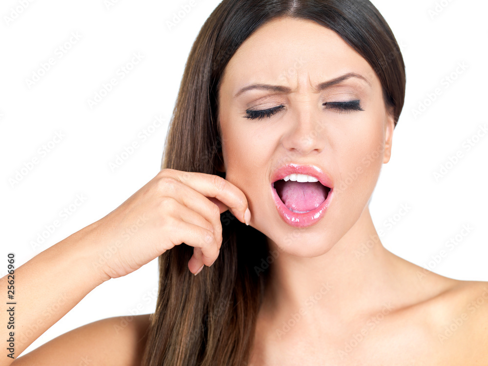Portrait of beautiful woman, she is pulling her skin on cheek Portrait of beautiful woman, she is pulling her skin on cheek