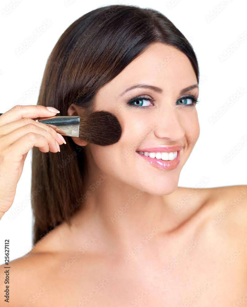 Portrait of beautiful woman she is doing makeup Portrait of beautiful woman she is doing makeup