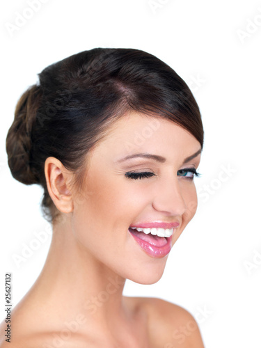 Portrait of beautiful woman, she blinking with one eye