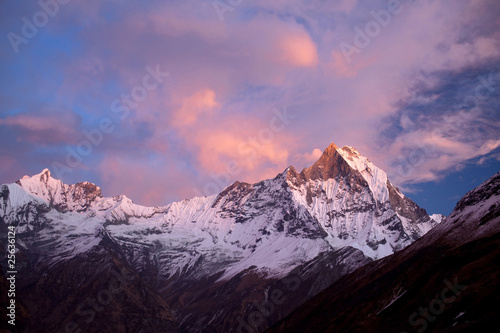 Mount Machapuchare sunset - view from Annapurna base camp. © Zzvet