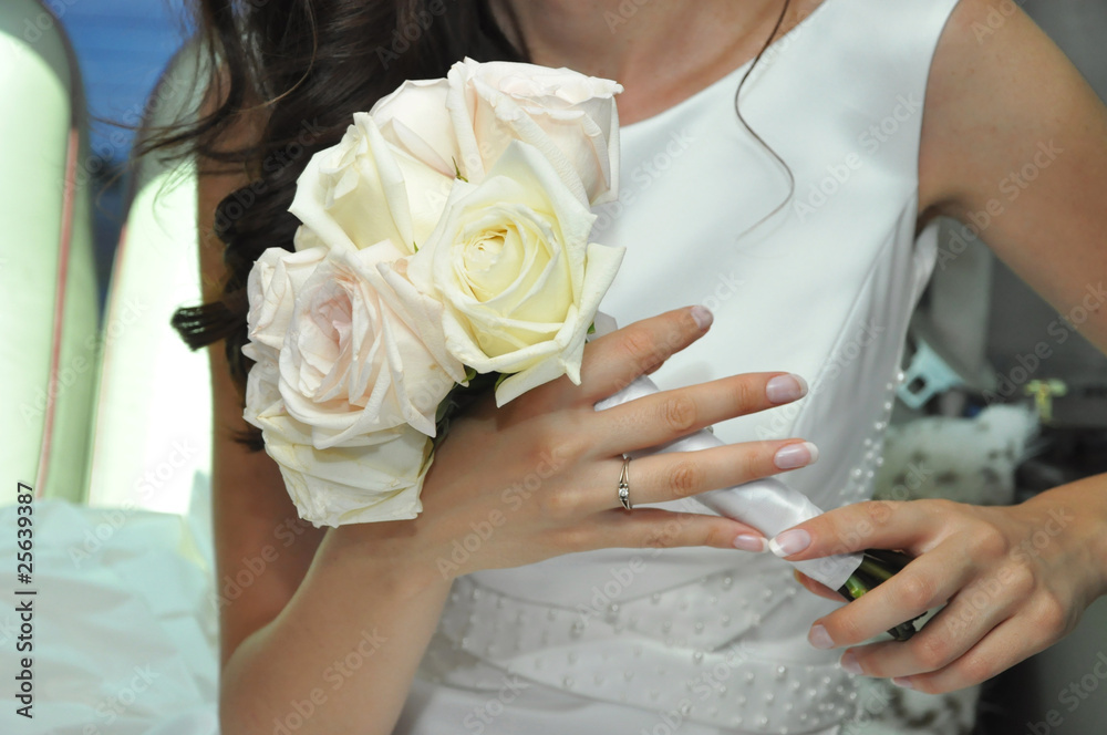 Bride holding beautiful wedding bouquet Bride holding beautiful wedding bouquet