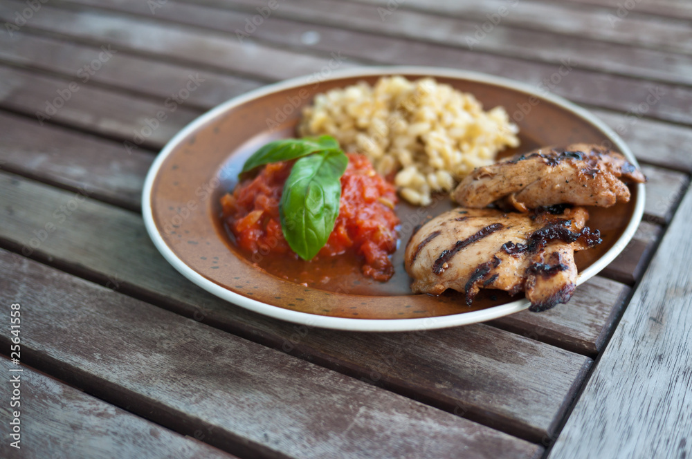 Grilled chicken with basil leaves Grilled chicken with basil leaves