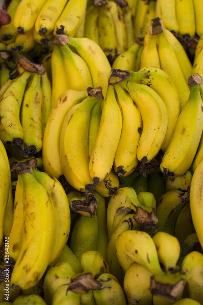 Fresh natural bananas background .