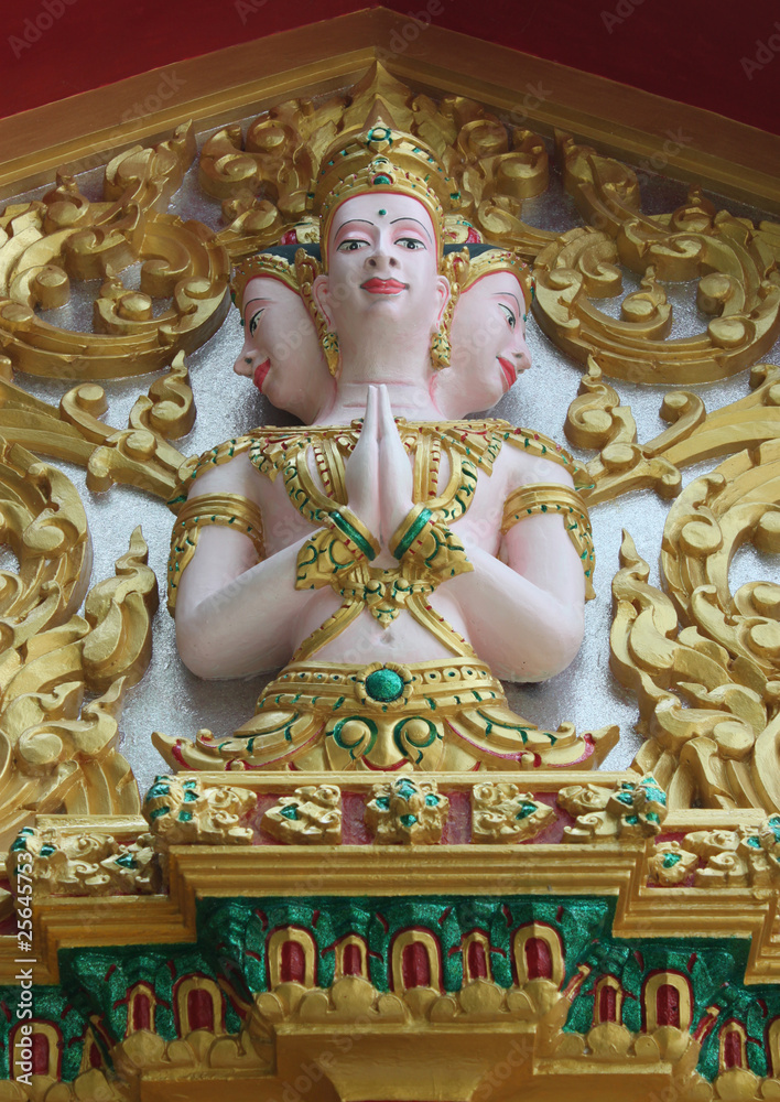 Thai art carving on gable of temple, Wat Ra Han, Buriram