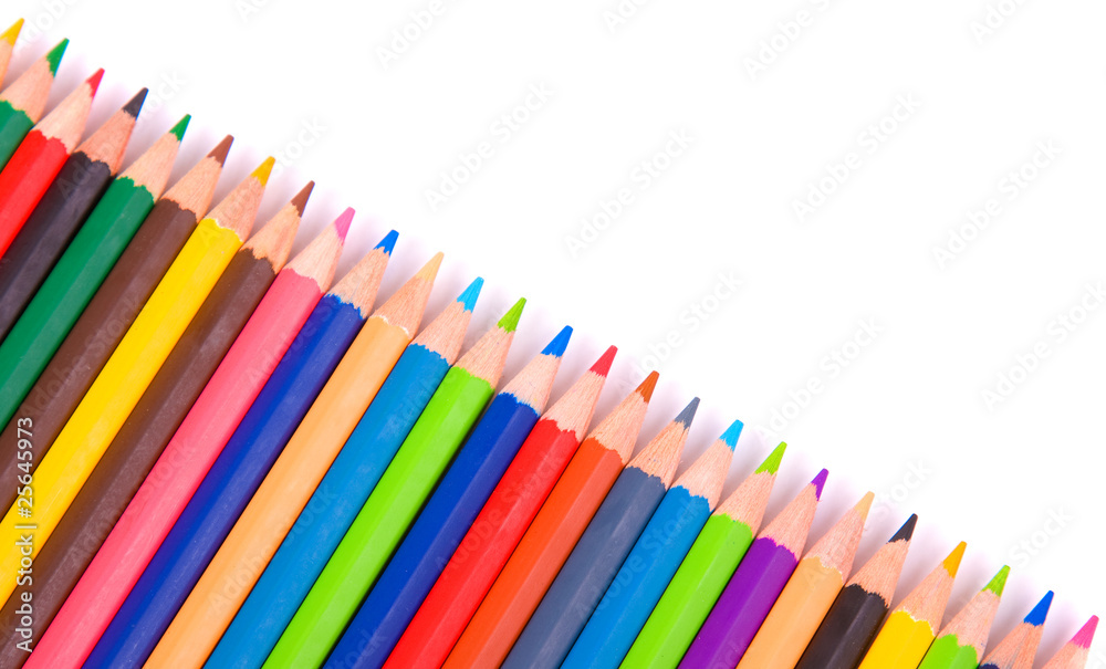 Colored pencils on a white background, studio shot Colored pencils on a white background, studio shot