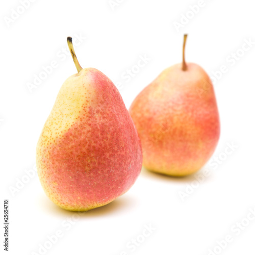 ripe yellow and red pears isolated on white background