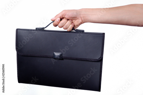 hand holding briefcase isolated