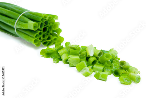 Cut green onion isolated on the white background