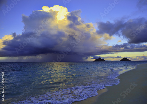 late afternoon offshore rainstorm at lanikai beach, hawaii photo