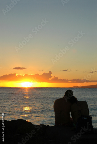Romantic Image of a Loving Couple Embracing at Sunset © Mr Doomits