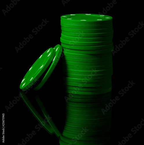 Gambling chips on black background