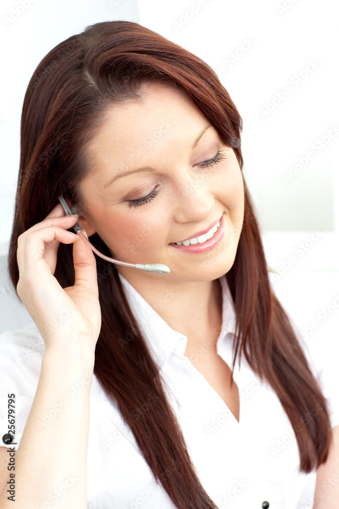 Delighted businesswoman wearing headphones Delighted businesswoman wearing headphones