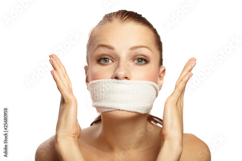 Photos Cute young woman with white band on the mouth