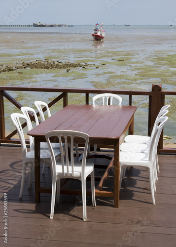 Table with a beautiful sea view © OlegD