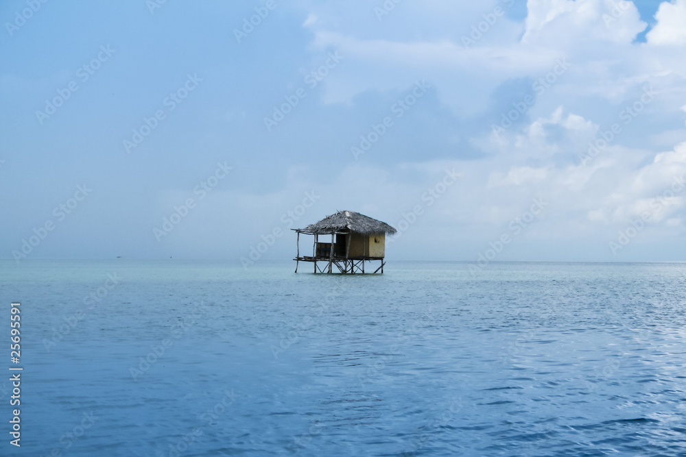 stilt house over ocean palawan