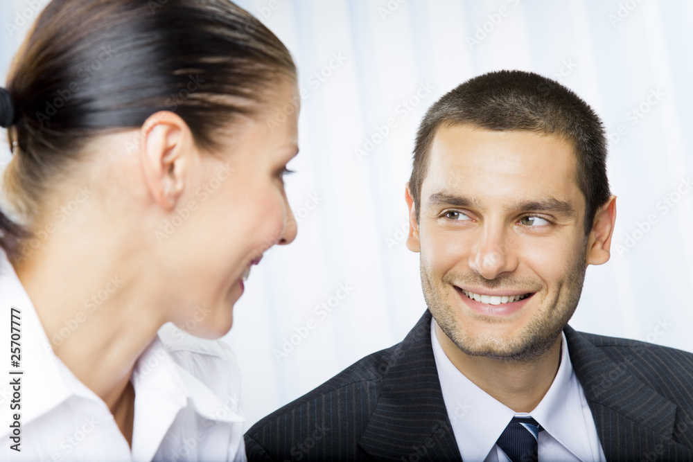 Two businesspeople, or businessman and client, at office Two businesspeople, or businessman and client, at office