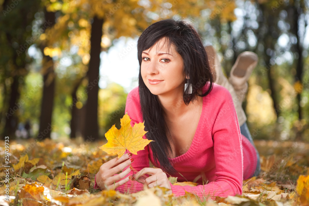 Young pretty woman in the autumn park Young pretty woman in the autumn park