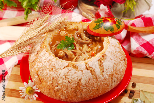 polish tripe soup (flaki) in bread bowl
